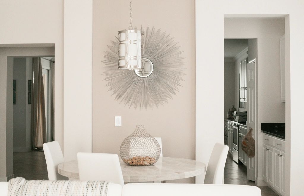 A suite sitting room with a sofa and armchairs